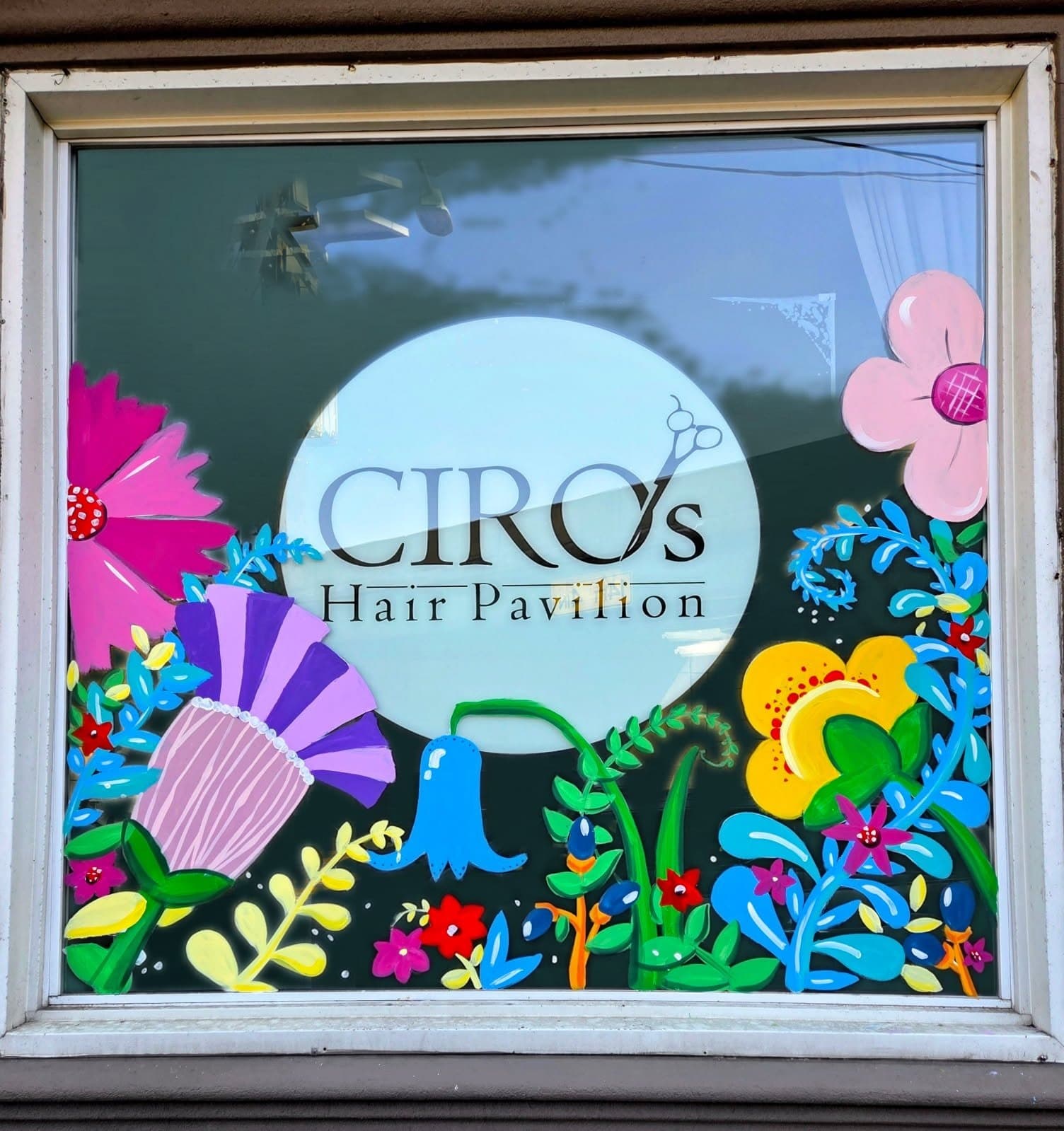 Hand-painted storefront window — by Kim Lonsky